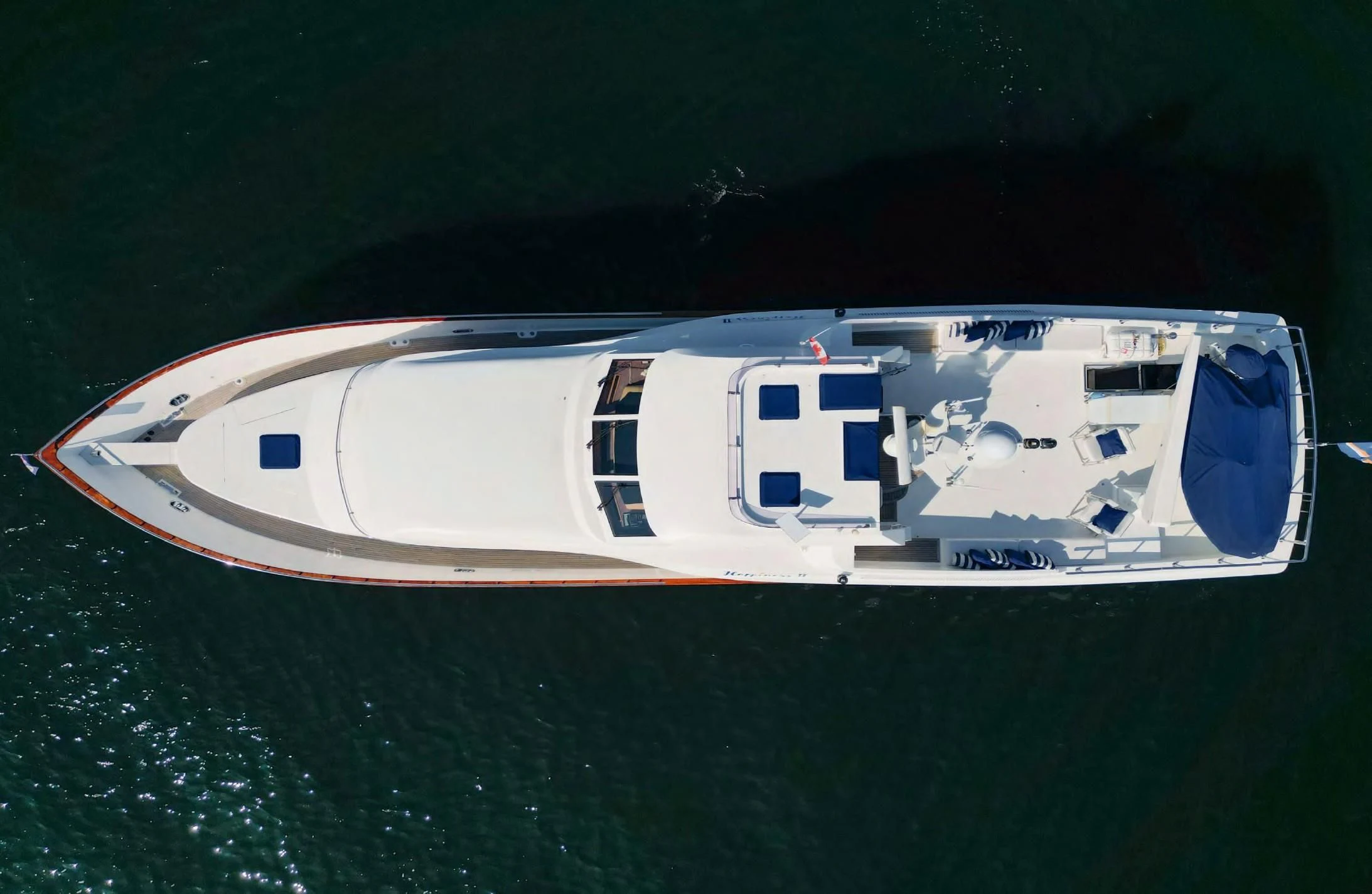 a boat on the water aboard HAPPINESS II Yacht for Sale