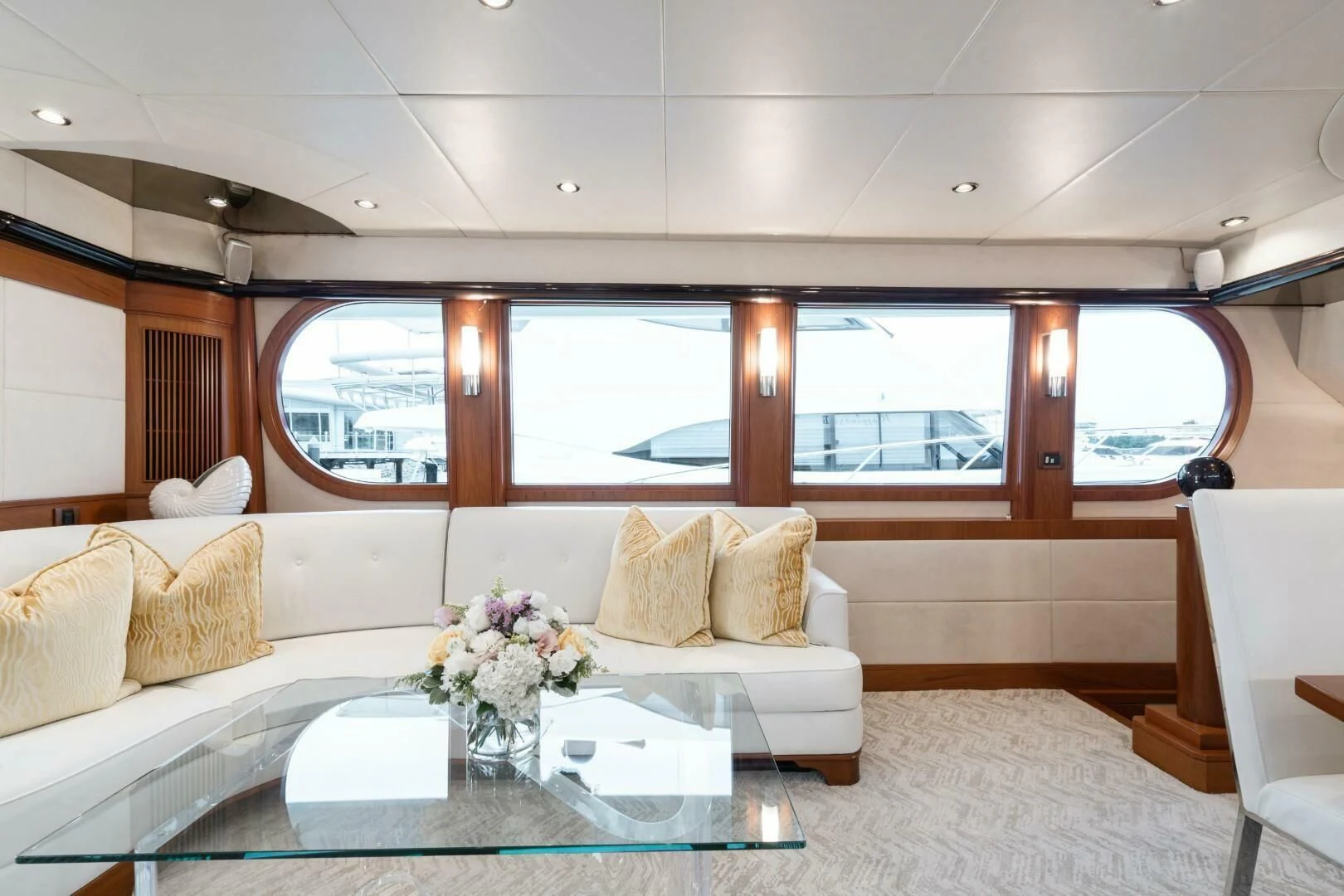a living room with a large window aboard HAPPINESS II Yacht for Sale