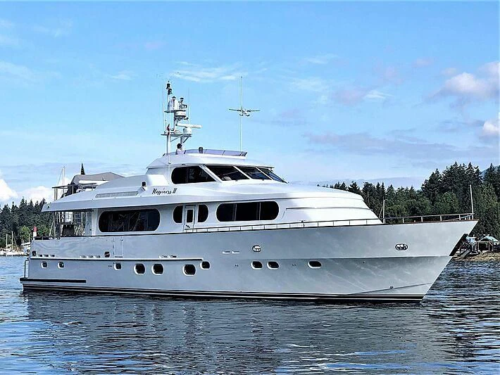 a large white boat aboard HAPPINESS II Yacht for Sale