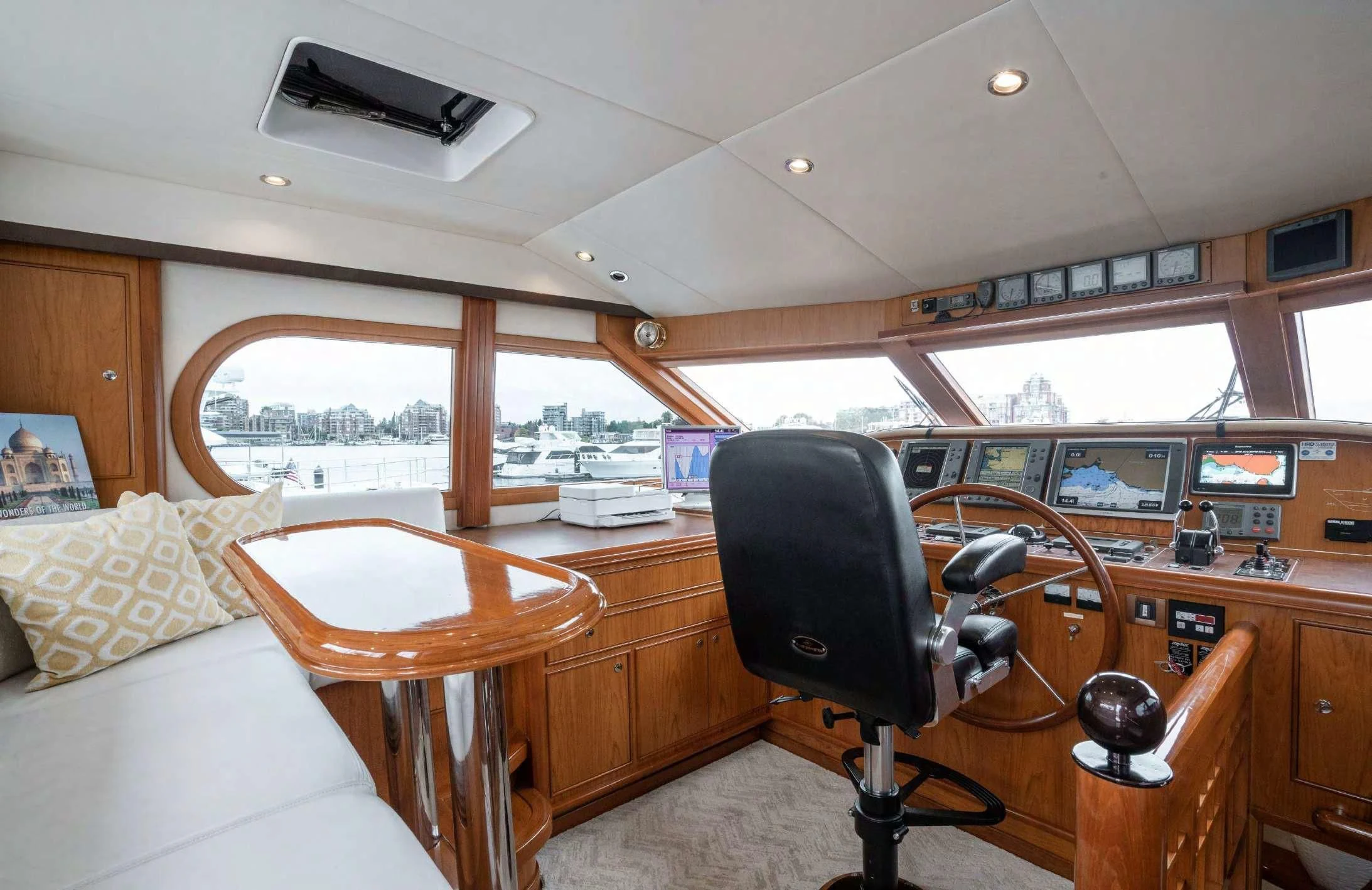 a room with a table and chairs aboard HAPPINESS II Yacht for Sale