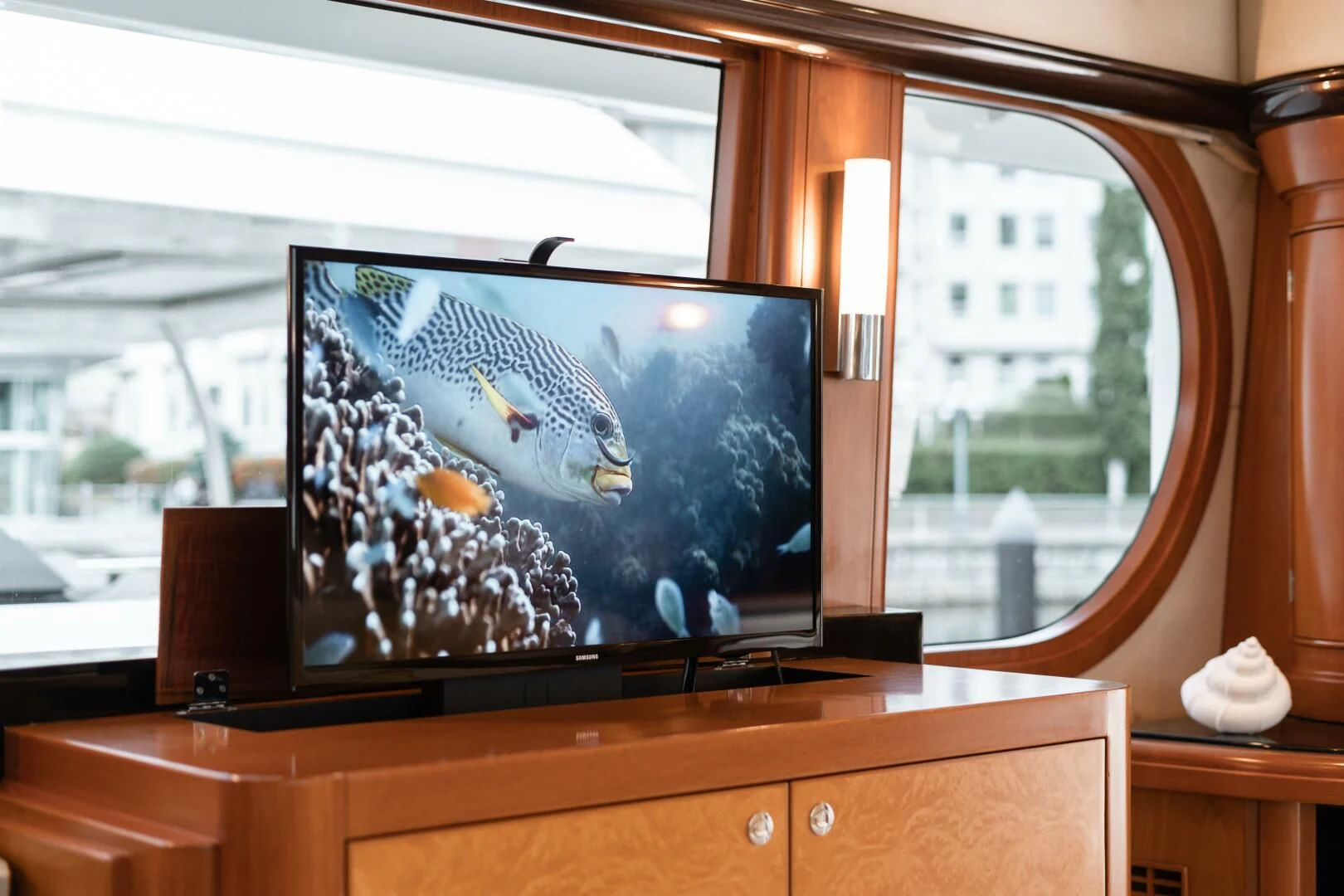 a tv on a stand aboard HAPPINESS II Yacht for Sale