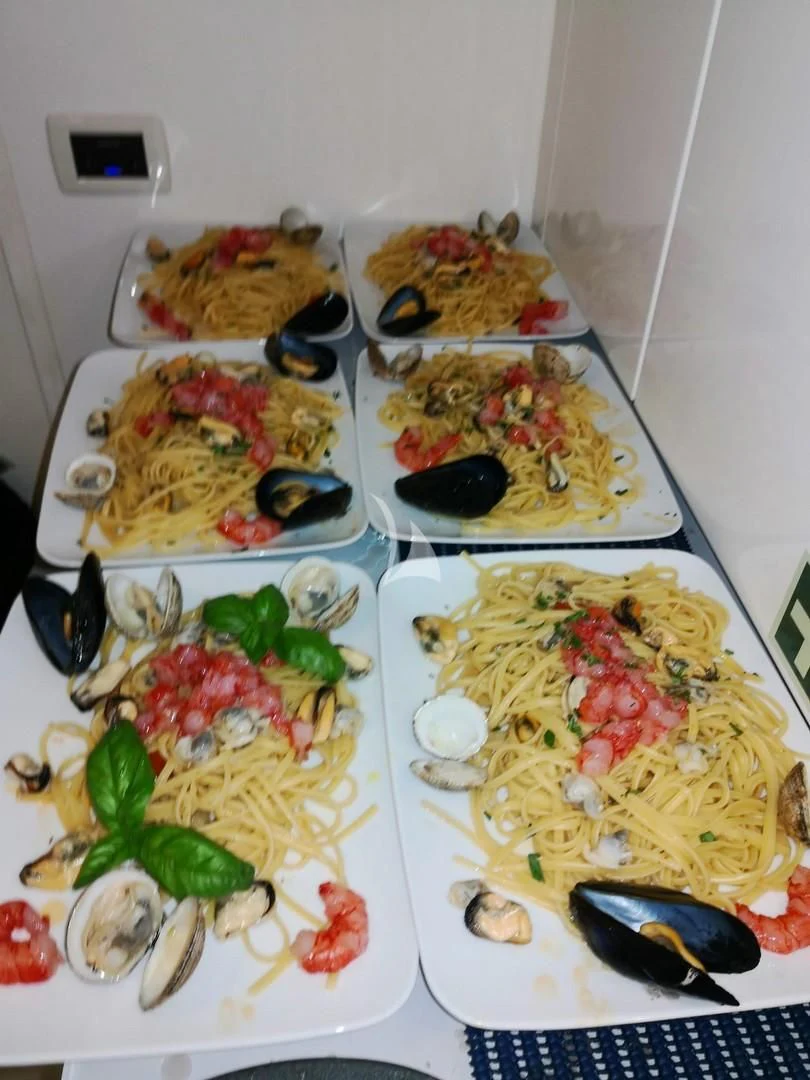 a table full of food aboard BLUE MAMBA Yacht for Sale