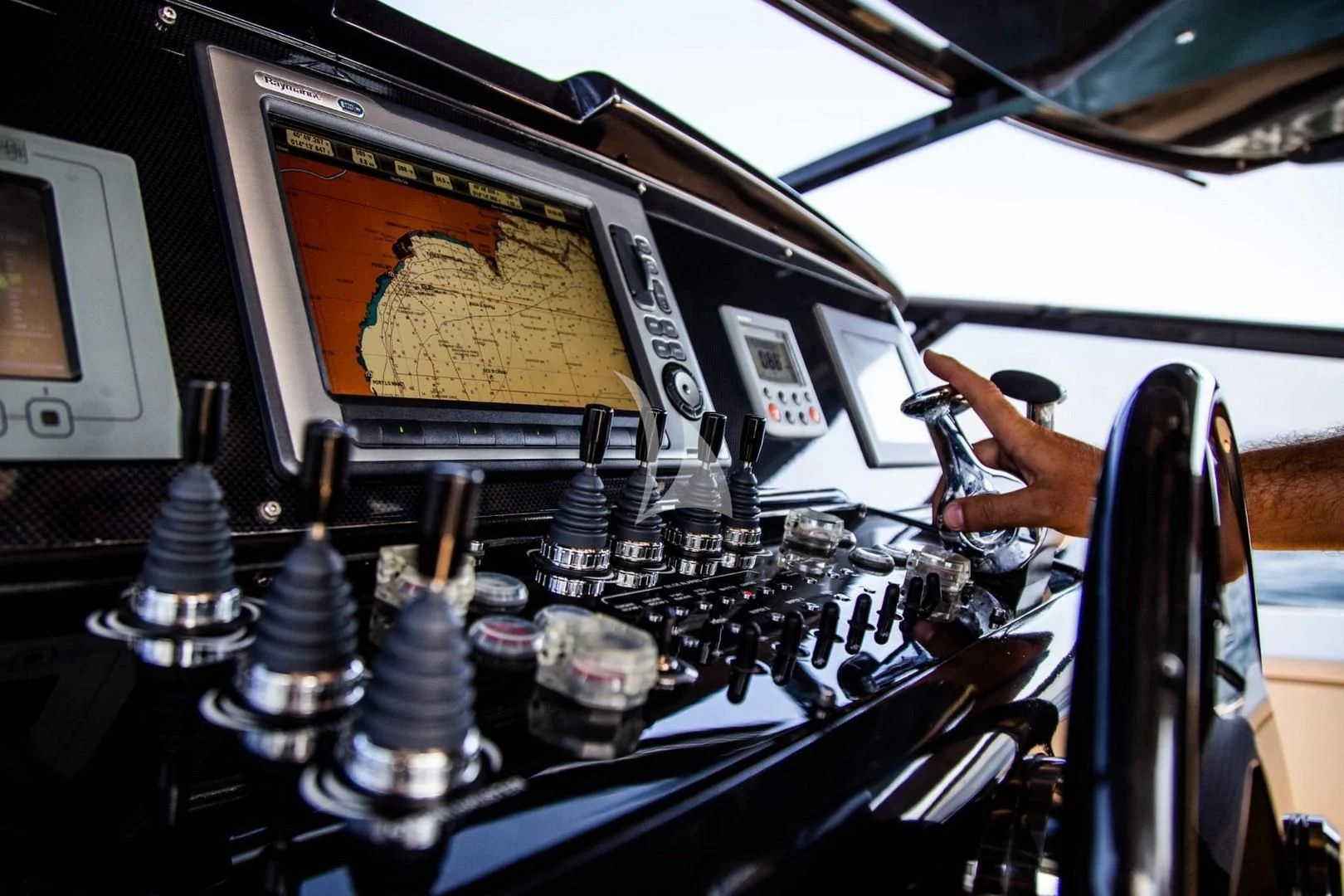 a person operating a machine aboard BLUE MAMBA Yacht for Sale