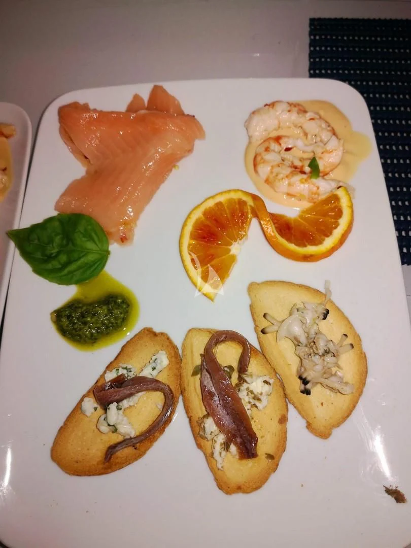 a plate of food aboard BLUE MAMBA Yacht for Sale