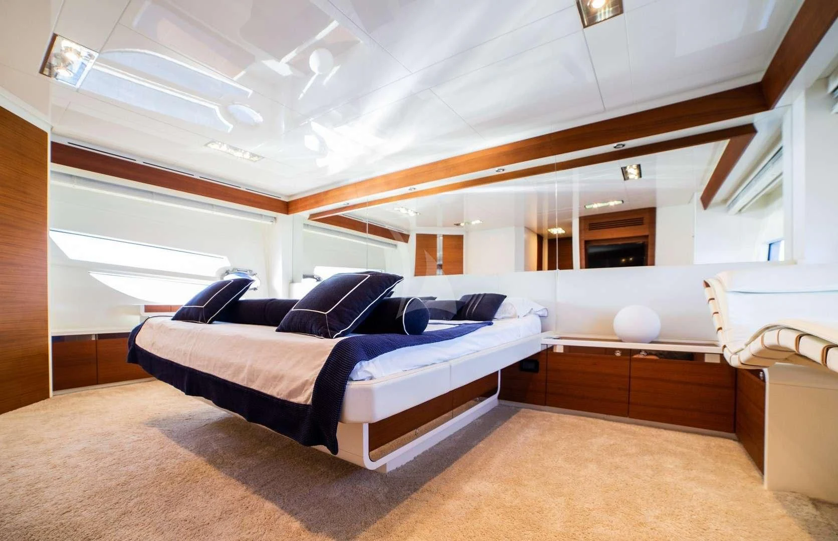 a large bed in a room aboard BLUE MAMBA Yacht for Sale