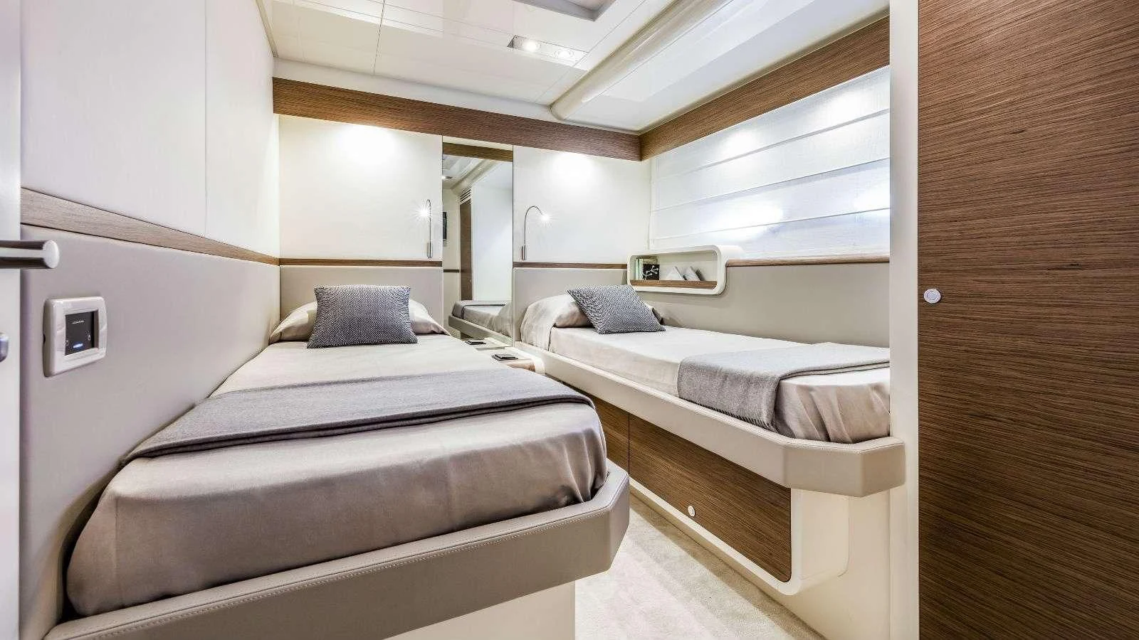 a room with two beds aboard BLUE MAMBA Yacht for Sale