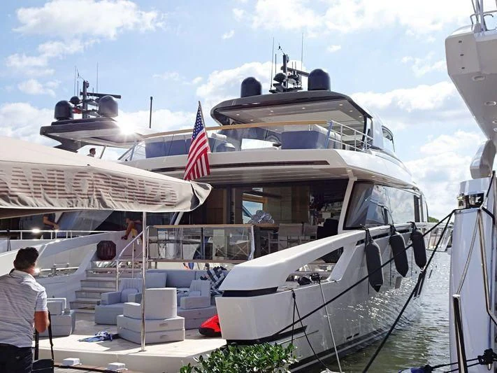 a boat docked at a pier aboard INFINITY Yacht for Sale