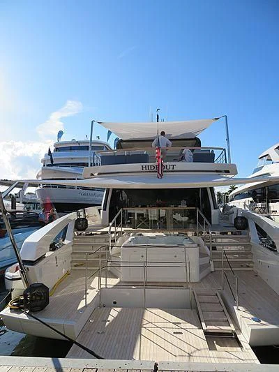 a boat docked at a pier aboard INFINITY Yacht for Sale
