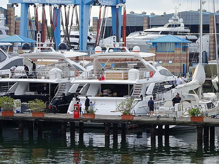 a boat docked at a pier aboard SILVIA Yacht for Sale