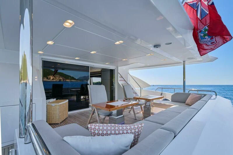 a room with a table and chairs aboard SILVIA Yacht for Sale