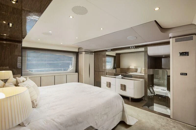 a bedroom with a bed and a sink aboard SILVIA Yacht for Sale