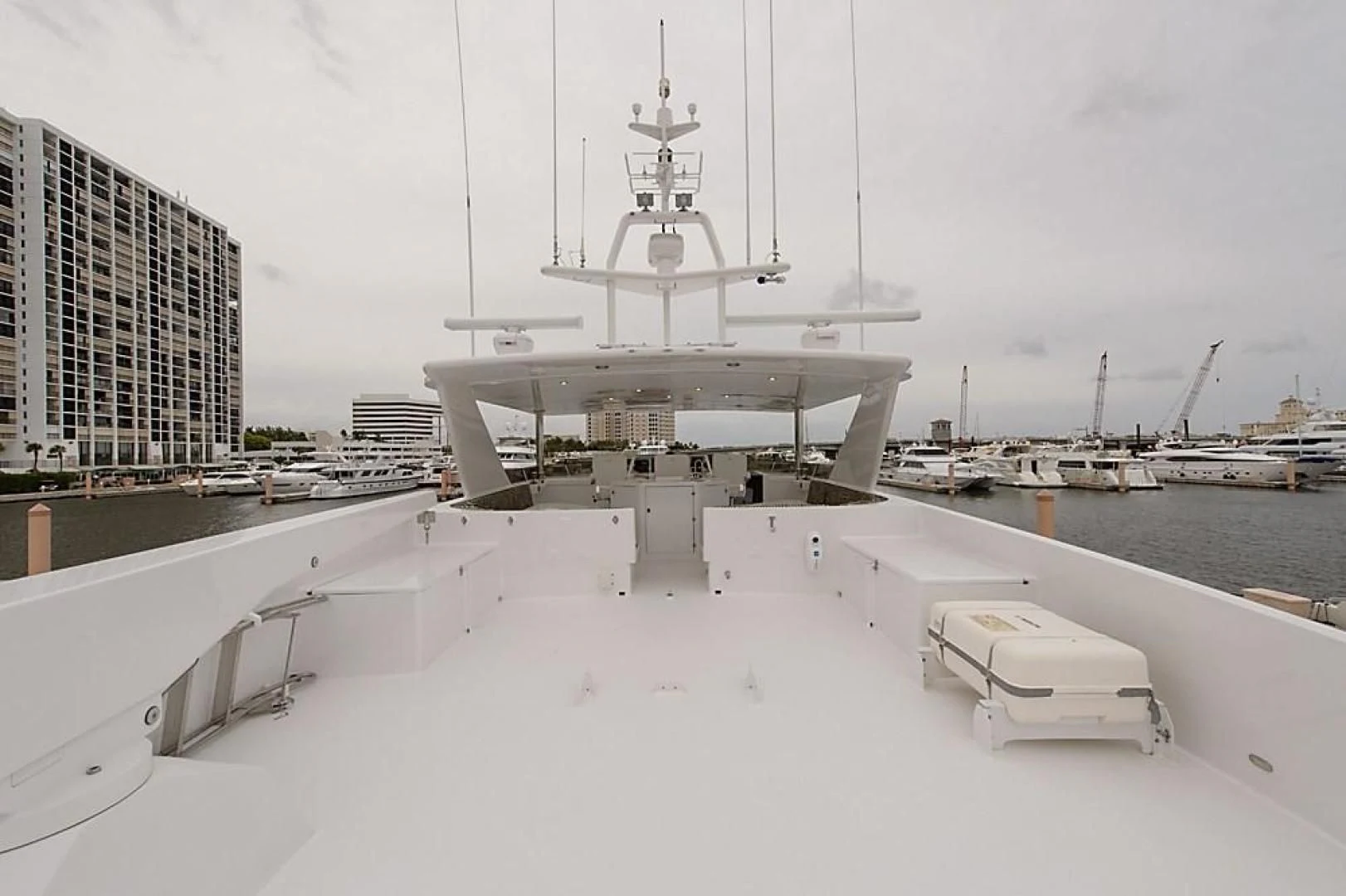 a large white ship docked aboard MALDAU Yacht for Sale
