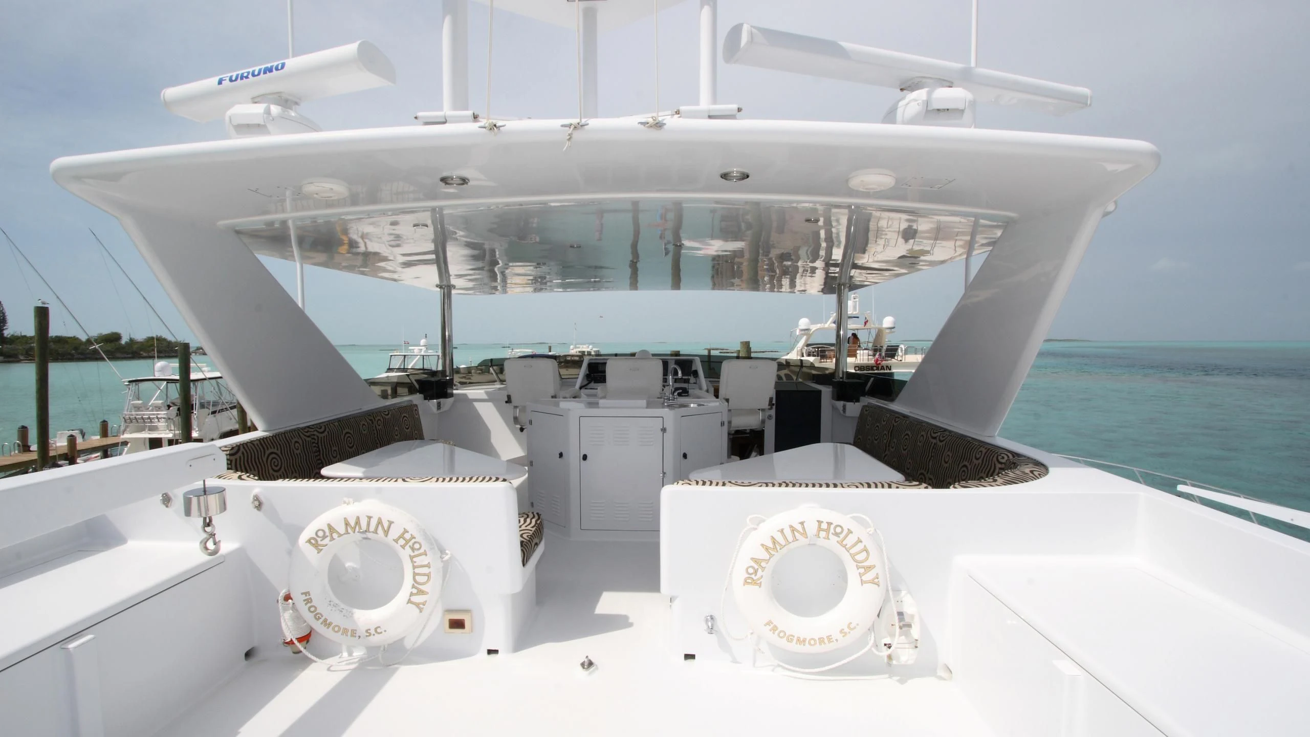 a large white boat with a round white object on the front aboard MALDAU Yacht for Sale