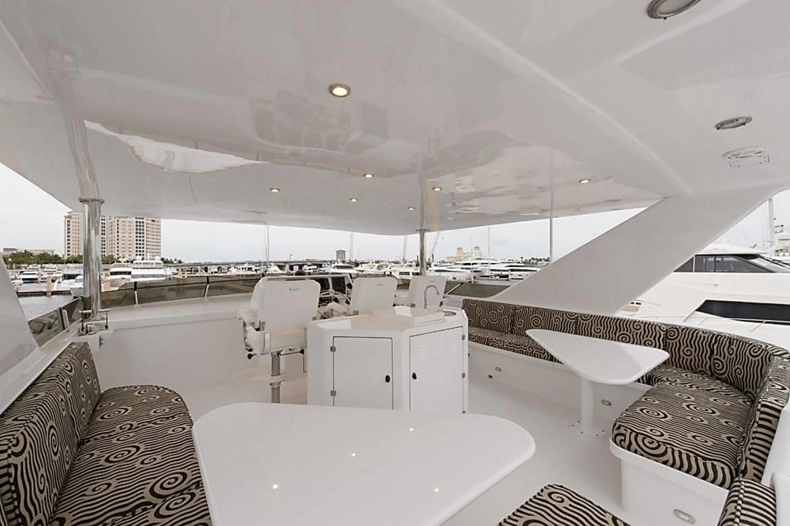 a room with a table chairs and a large white table aboard MALDAU Yacht for Sale