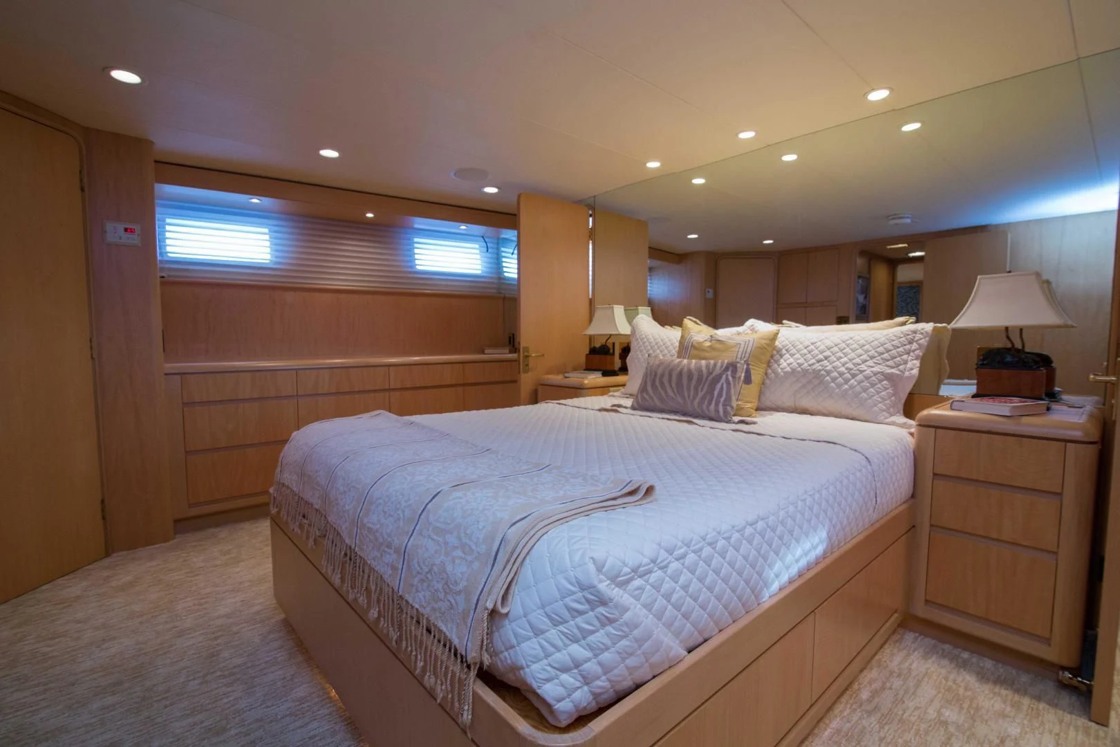 a bedroom with a bed and a desk aboard MALDAU Yacht for Sale