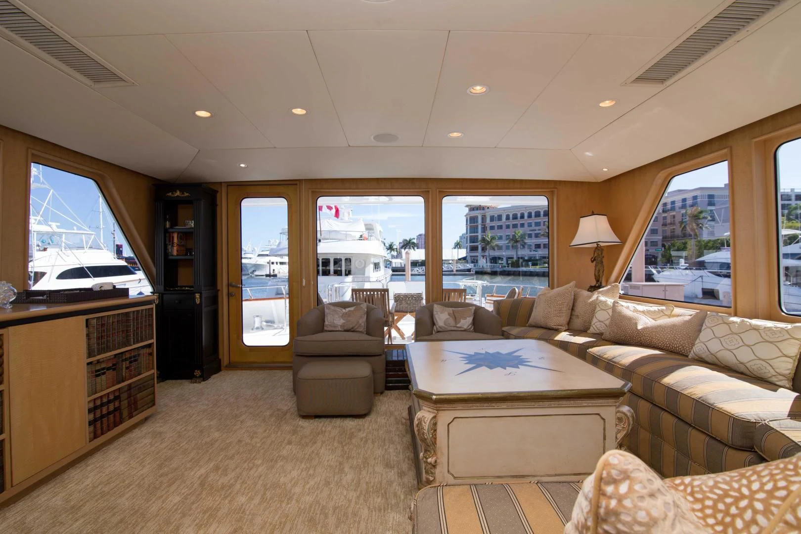 a living room with a large window aboard MALDAU Yacht for Sale