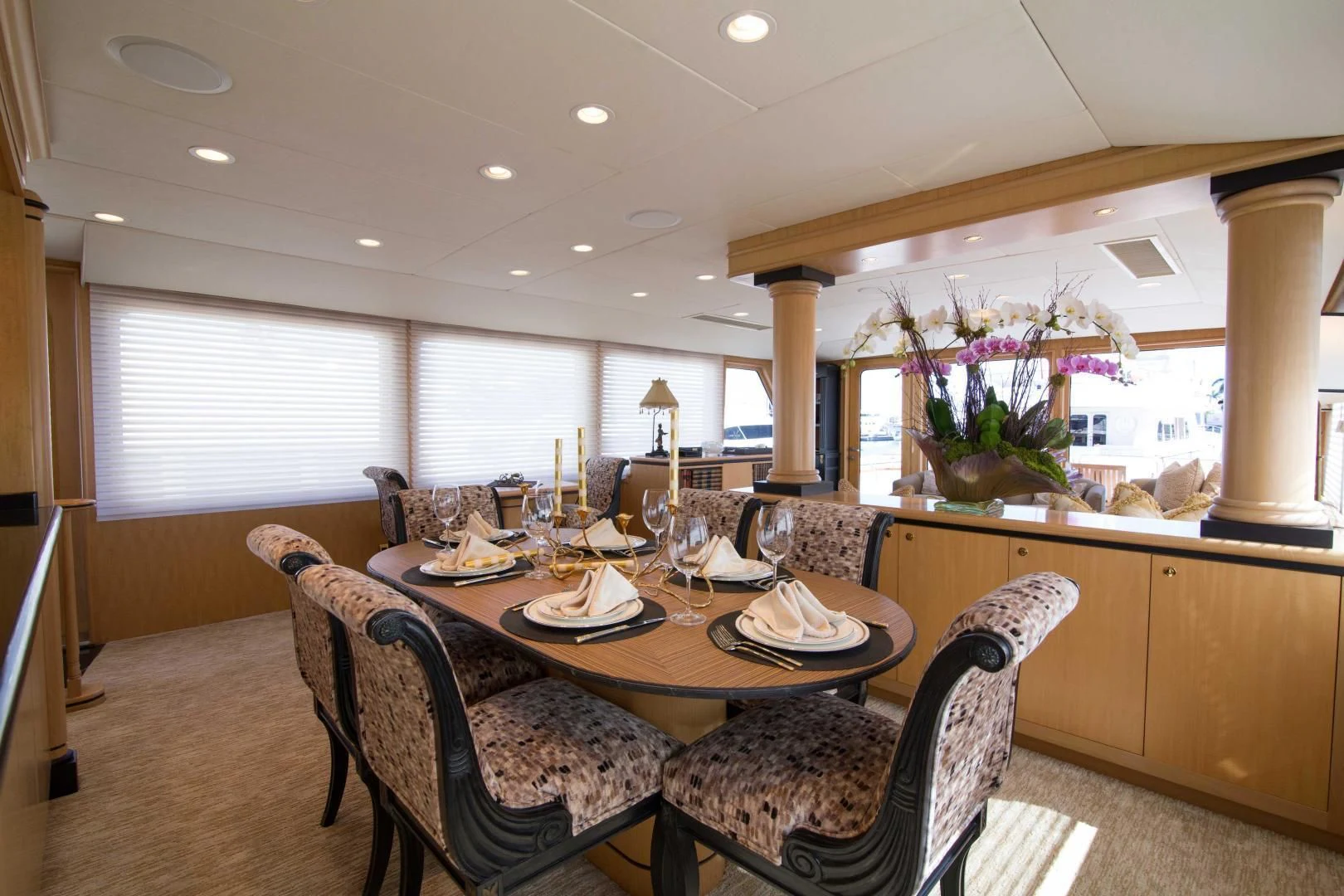 a dining room with a table and chairs aboard MALDAU Yacht for Sale
