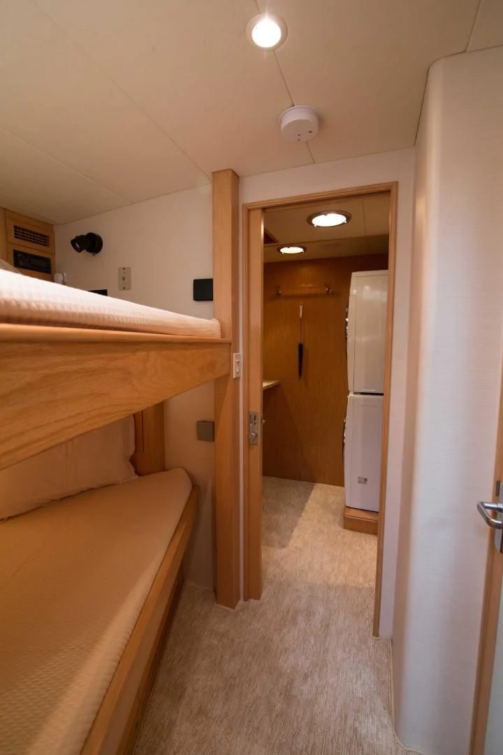 a hallway with a couple of beds aboard MALDAU Yacht for Sale