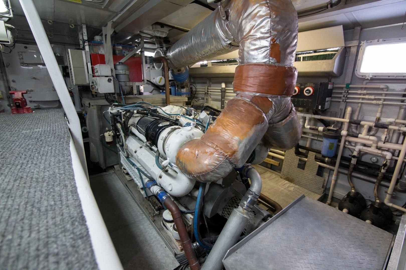 a person working on a machine aboard MALDAU Yacht for Sale