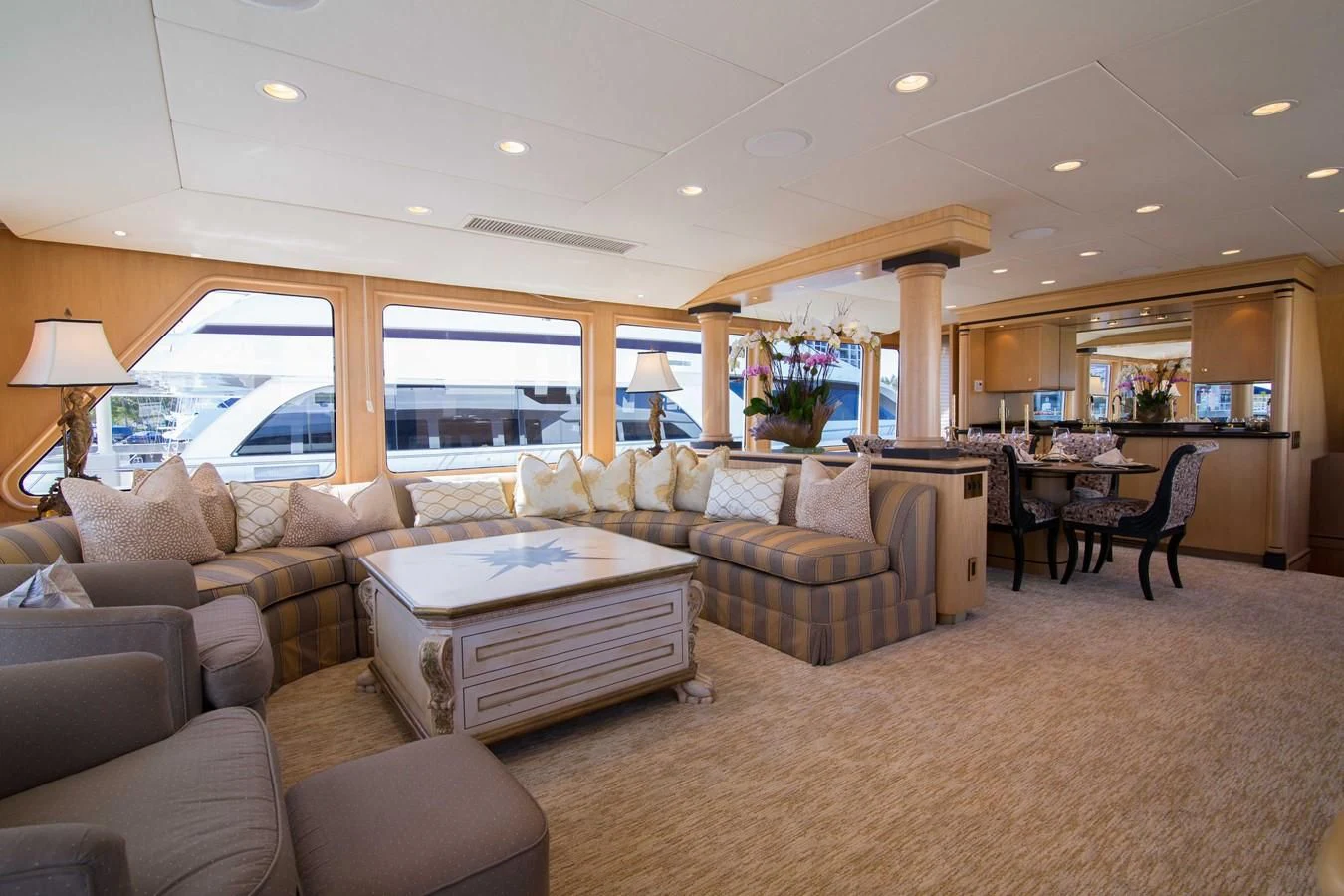 a living room with a large window aboard MALDAU Yacht for Sale