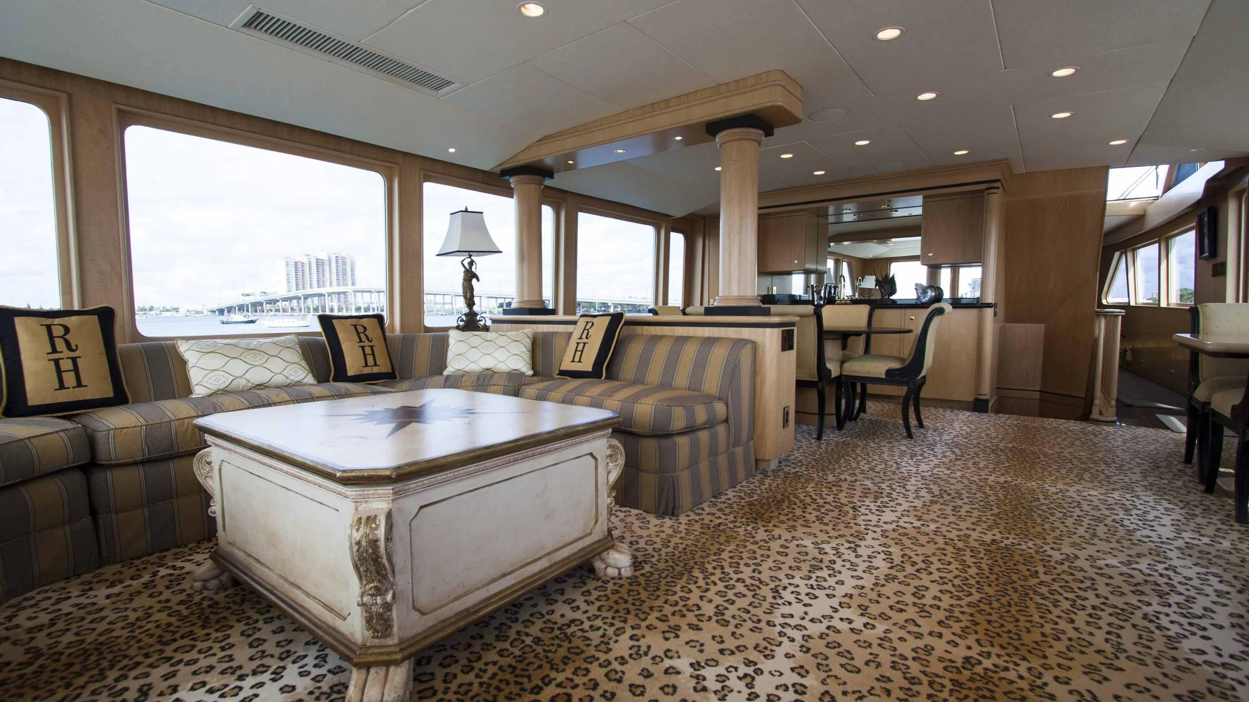 a living room with a large sofa aboard MALDAU Yacht for Sale