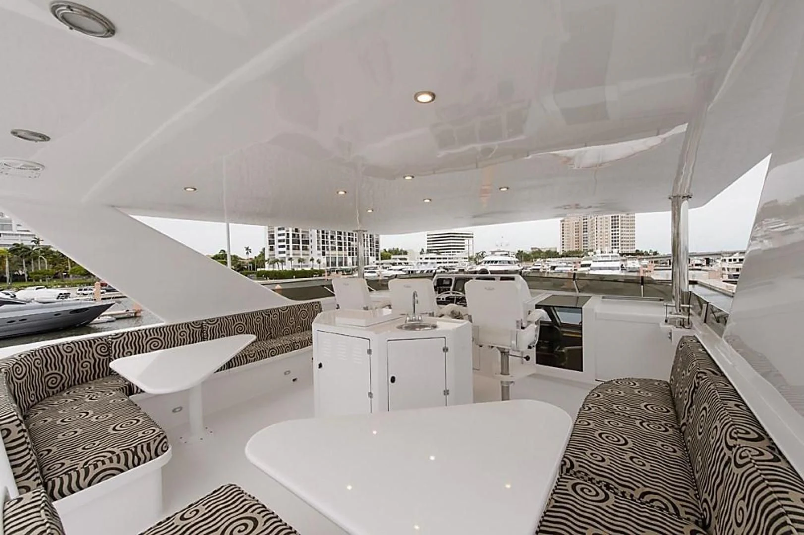 a room with a table and chairs aboard MALDAU Yacht for Sale
