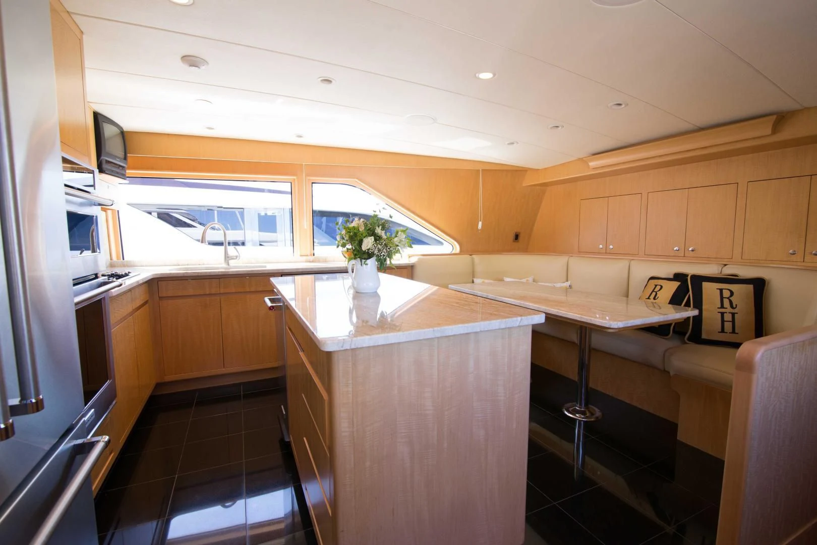 a kitchen with a counter and cabinets aboard MALDAU Yacht for Sale
