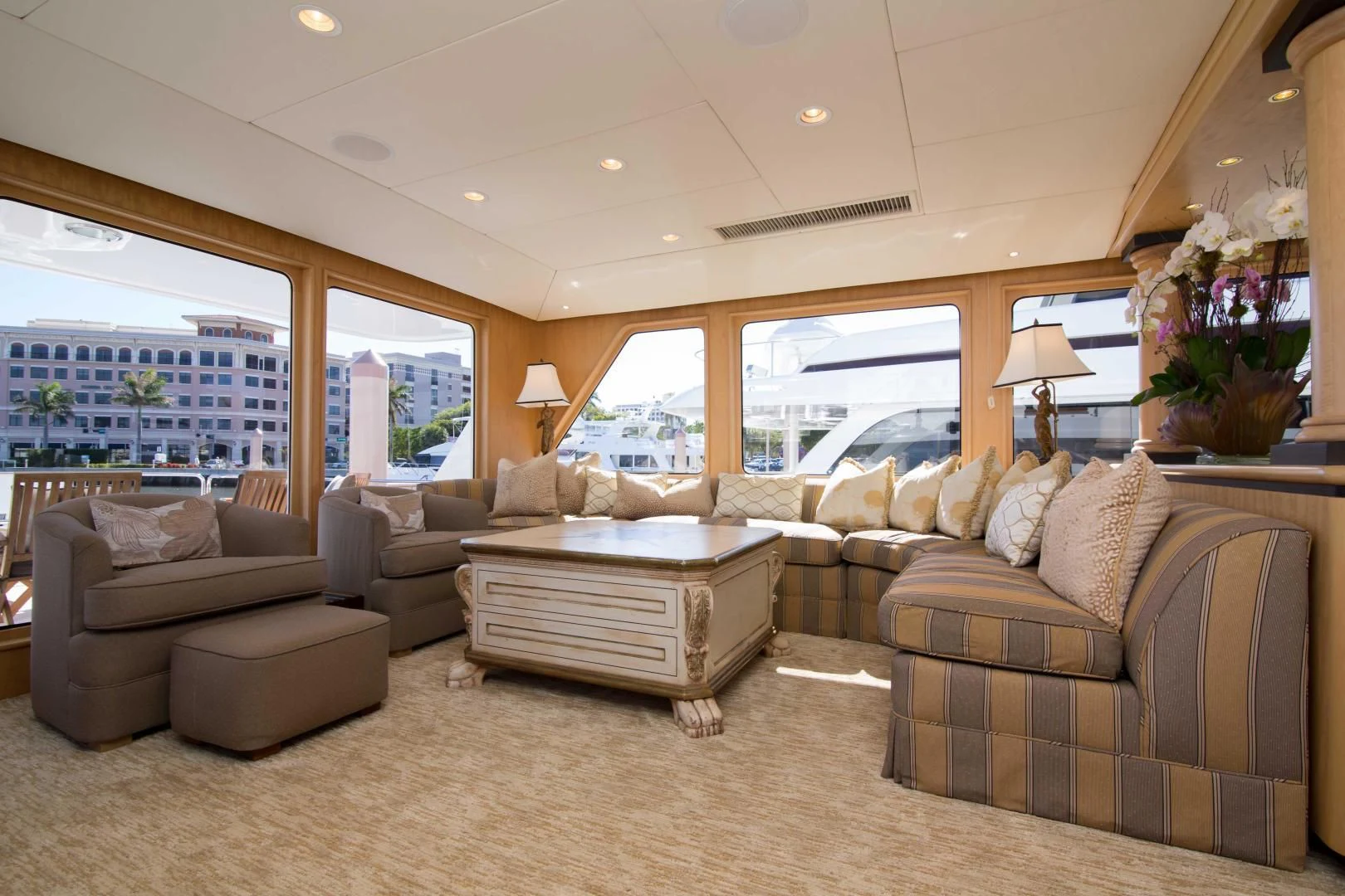 a living room with a large window aboard MALDAU Yacht for Sale