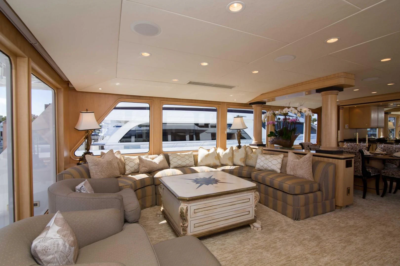 a living room with a large window aboard MALDAU Yacht for Sale