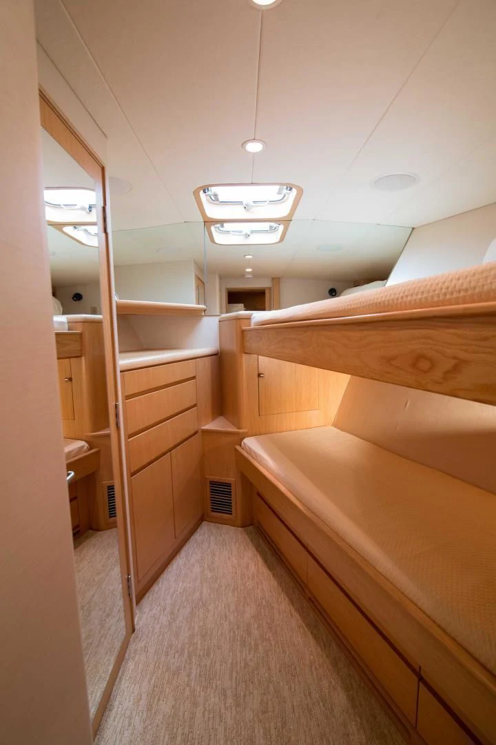 a bathroom with wooden cabinets aboard MALDAU Yacht for Sale