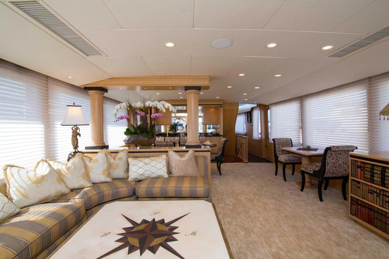 a living room with a couch and a table aboard MALDAU Yacht for Sale