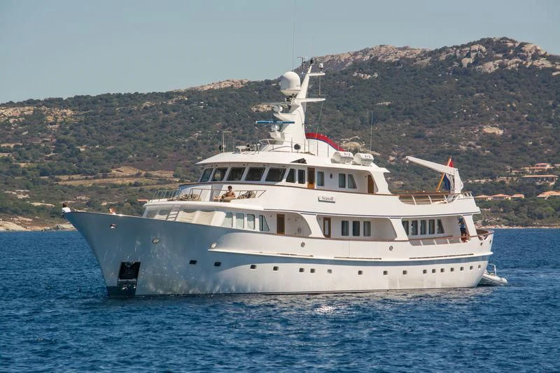 a large white boat in the water aboard SIDARTA Yacht for Sale