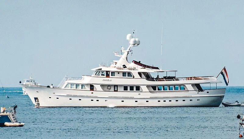 a large white boat in the water aboard SIDARTA Yacht for Sale