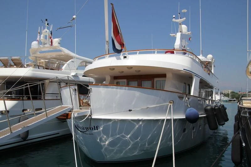 a couple of boats are parked in a harbor aboard SIDARTA Yacht for Sale