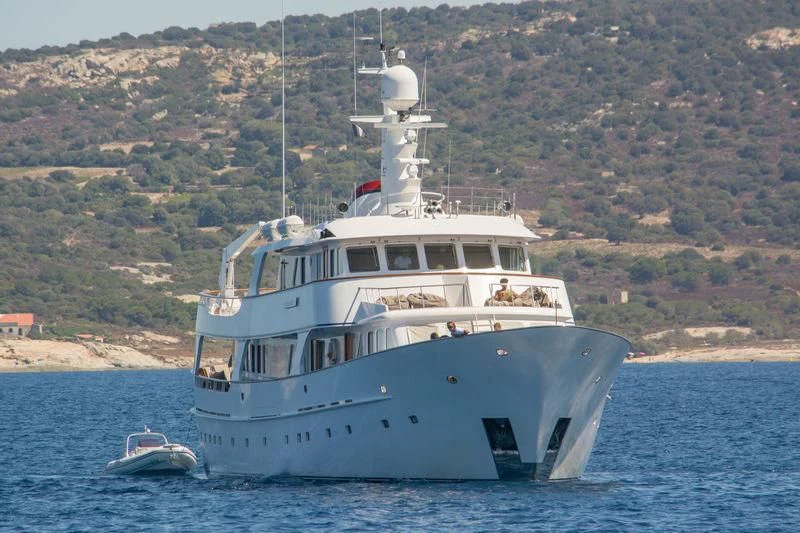 a large white boat on the water aboard SIDARTA Yacht for Sale