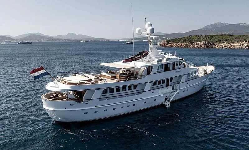 a large white boat in the water aboard SIDARTA Yacht for Sale