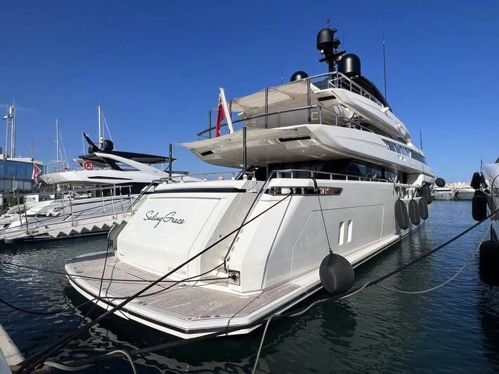 a boat docked at a pier aboard SAILING GRACE Yacht for Sale