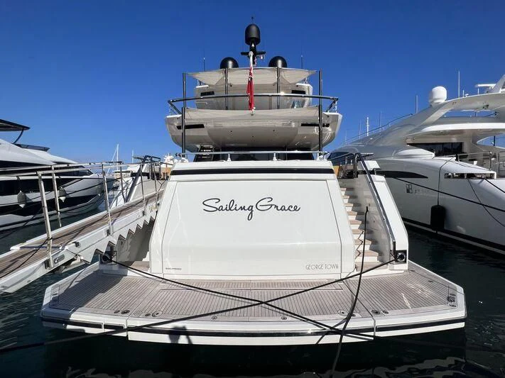 a boat docked at a pier aboard SAILING GRACE Yacht for Sale