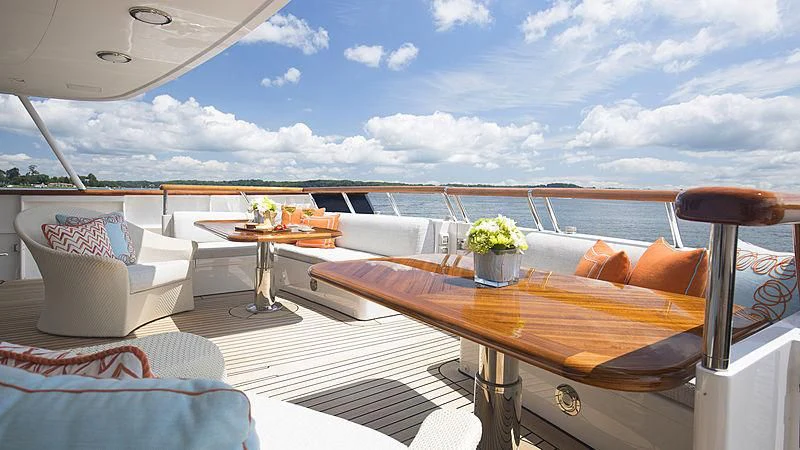 a room with a table and chairs aboard ENDEAVOUR 2 Yacht for Sale