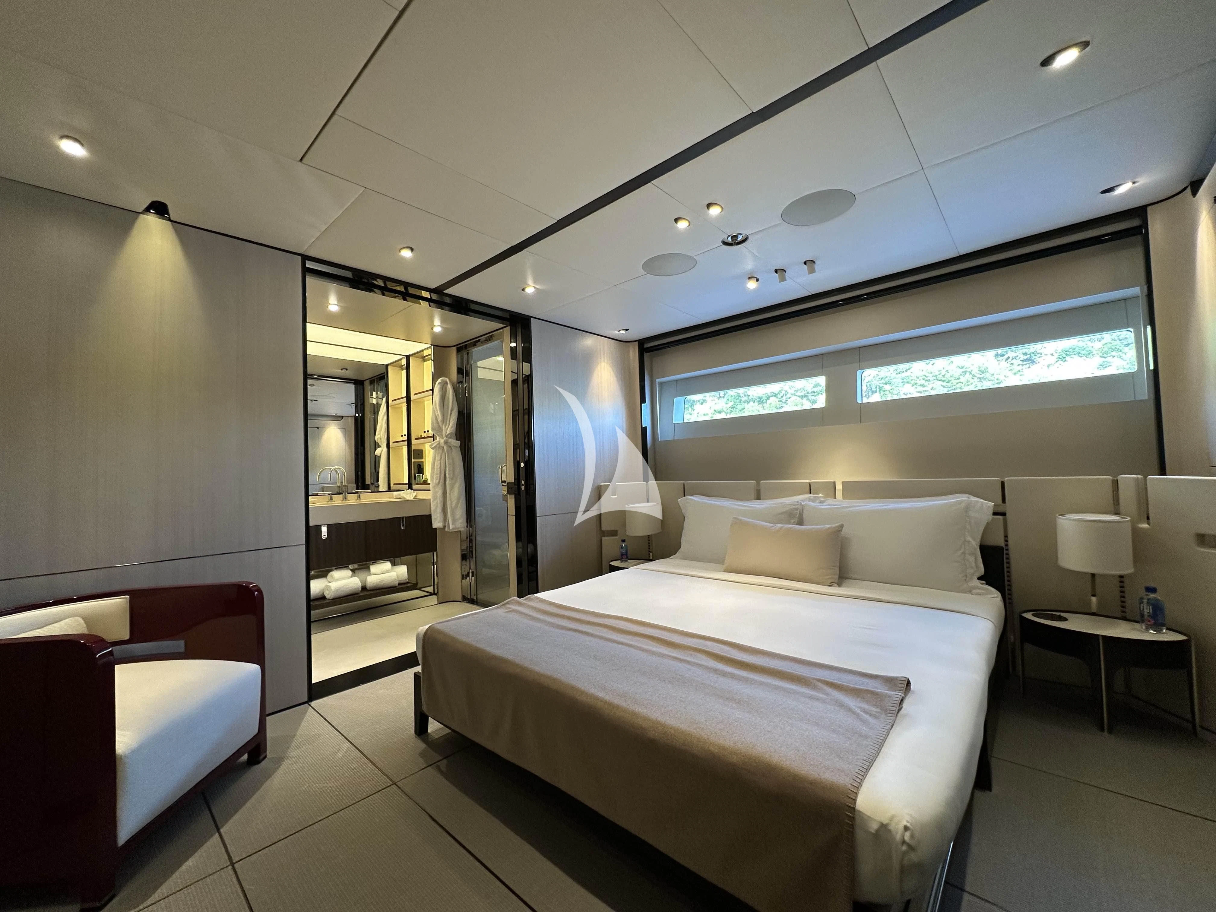 a room with a bed and a mirror aboard ENDEAVOUR 2 Yacht for Sale