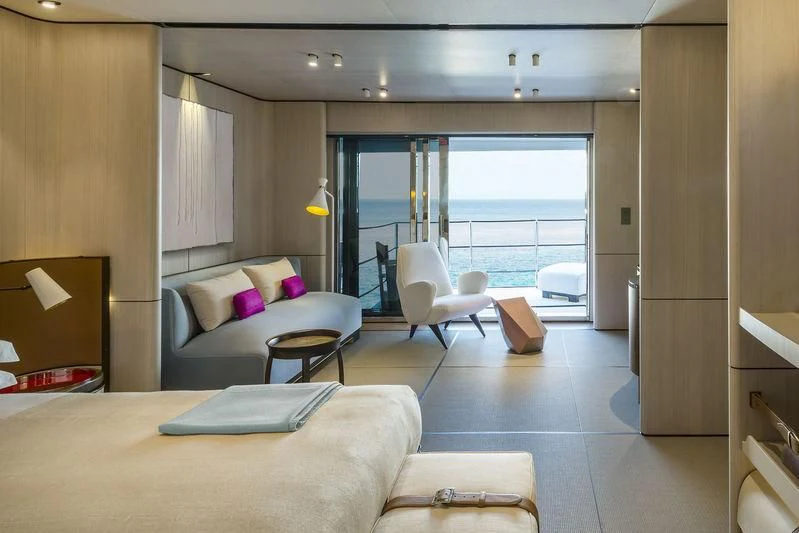 a living room with a large window aboard ENDEAVOUR 2 Yacht for Sale