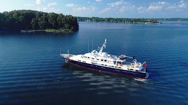 a large boat in the water aboard ENDEAVOUR 2 Yacht for Sale