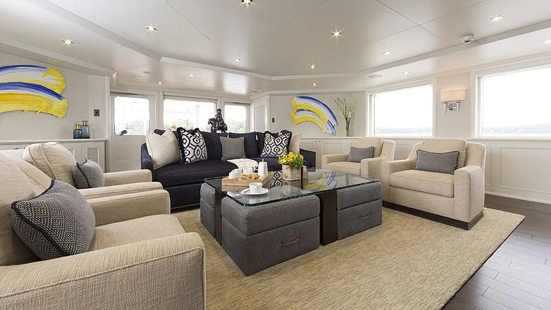a living room with a large window aboard ENDEAVOUR 2 Yacht for Sale