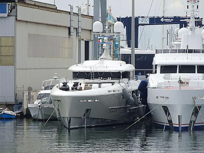 a couple of boats sit in a harbor aboard ENDEAVOUR 2 Yacht for Sale