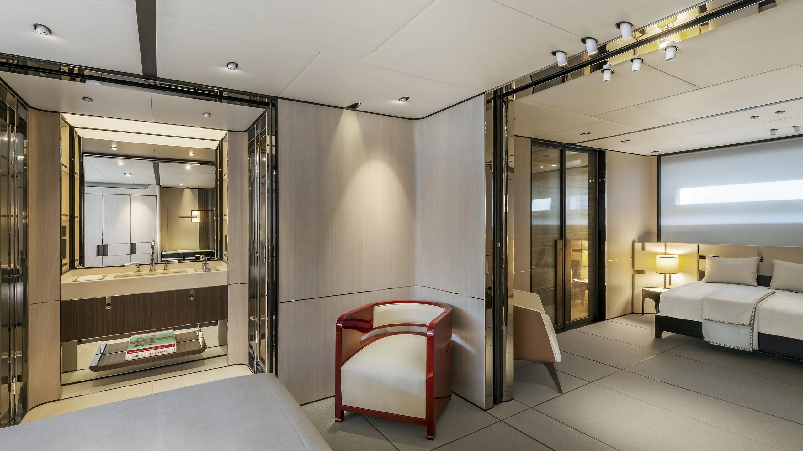 a room with a bed and a desk aboard ENDEAVOUR 2 Yacht for Sale