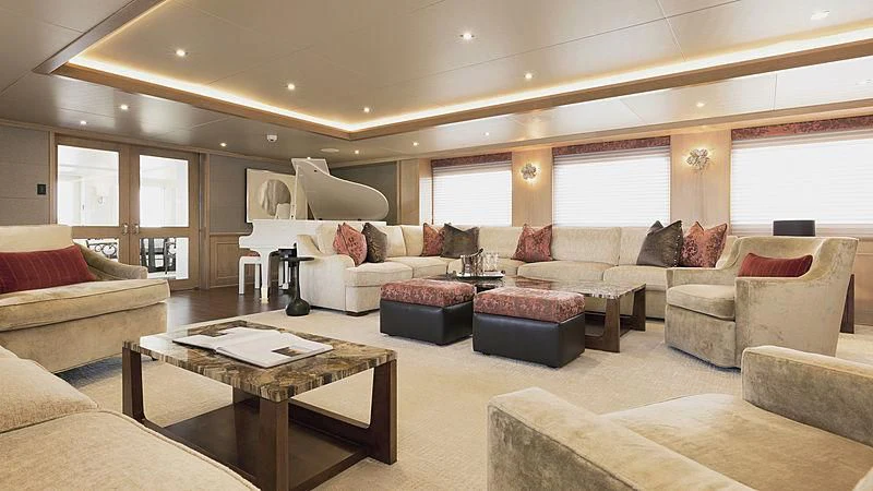 a living room with a couch and a table aboard ENDEAVOUR 2 Yacht for Sale