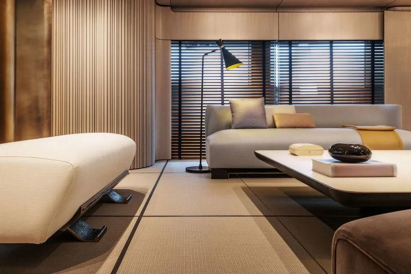 a living room with a couch and a table aboard ENDEAVOUR 2 Yacht for Sale