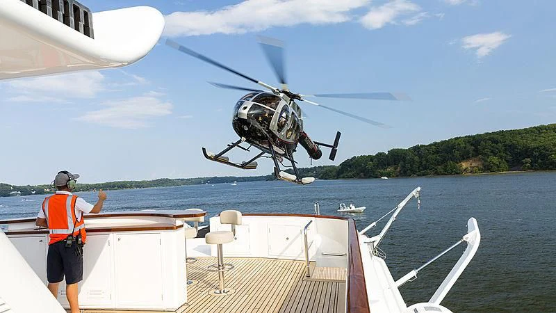 a helicopter flying over a boat aboard ENDEAVOUR 2 Yacht for Sale