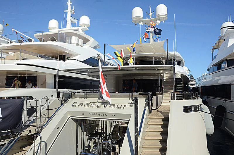 a boat with a flag on the front aboard ENDEAVOUR 2 Yacht for Sale