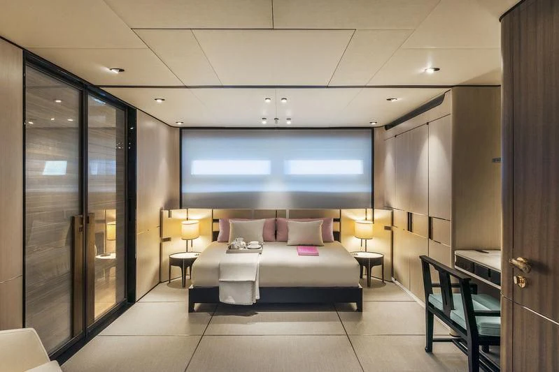 a room with a bed and a tv aboard ENDEAVOUR 2 Yacht for Sale